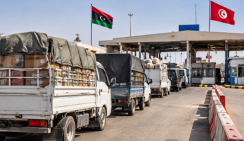ضريبة غير معلنة على شاحنات البضائع بمعبر وازن تثير التساؤلات